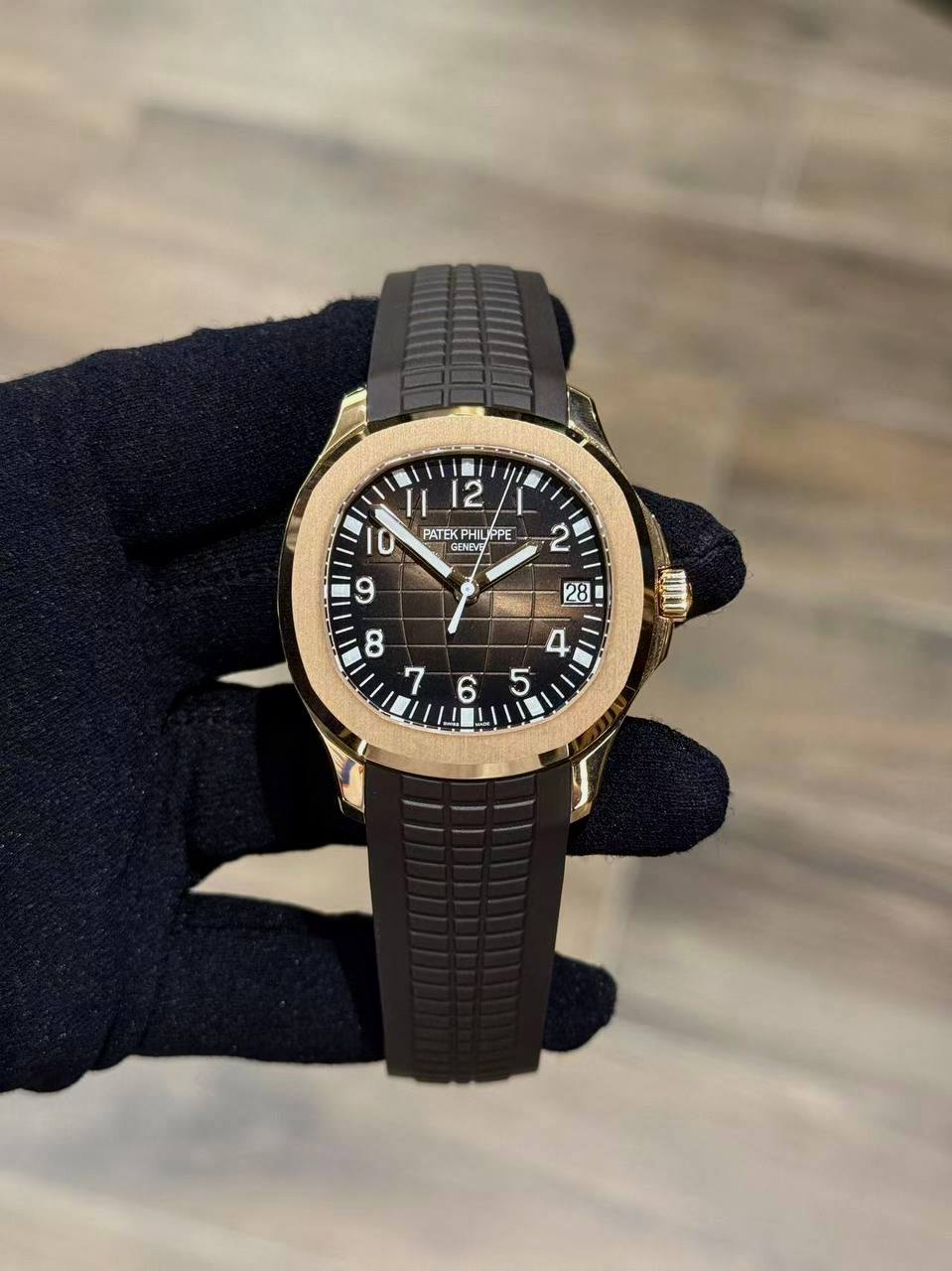 Patek Phillippe Aquanaut Date. Sweep Seconds
