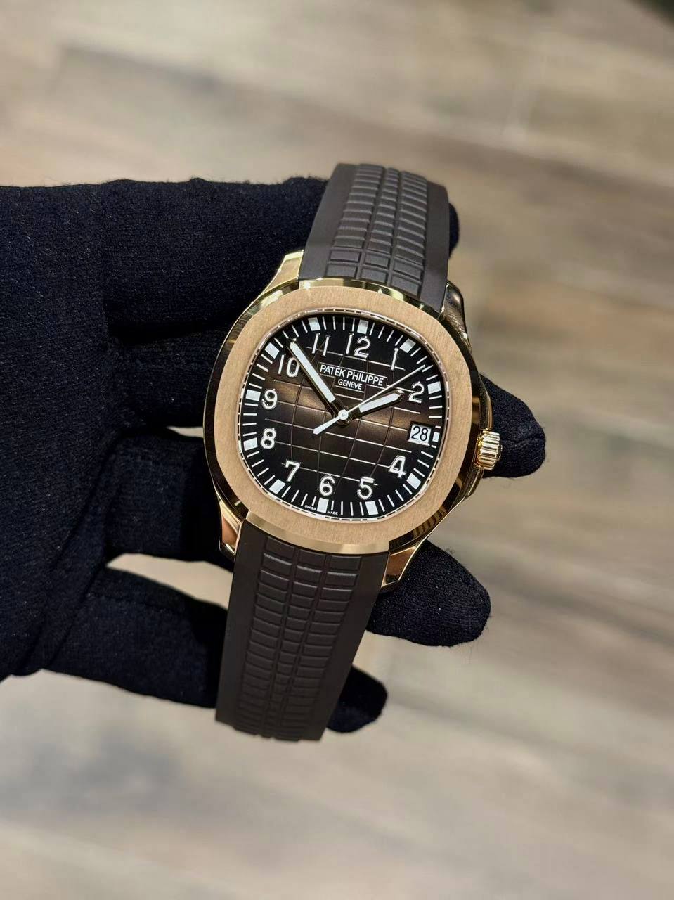 Patek Phillippe Aquanaut Date. Sweep Seconds