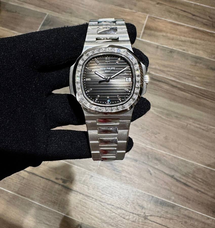 Patek Philippe Nautilus. Date. Sweep Seconds